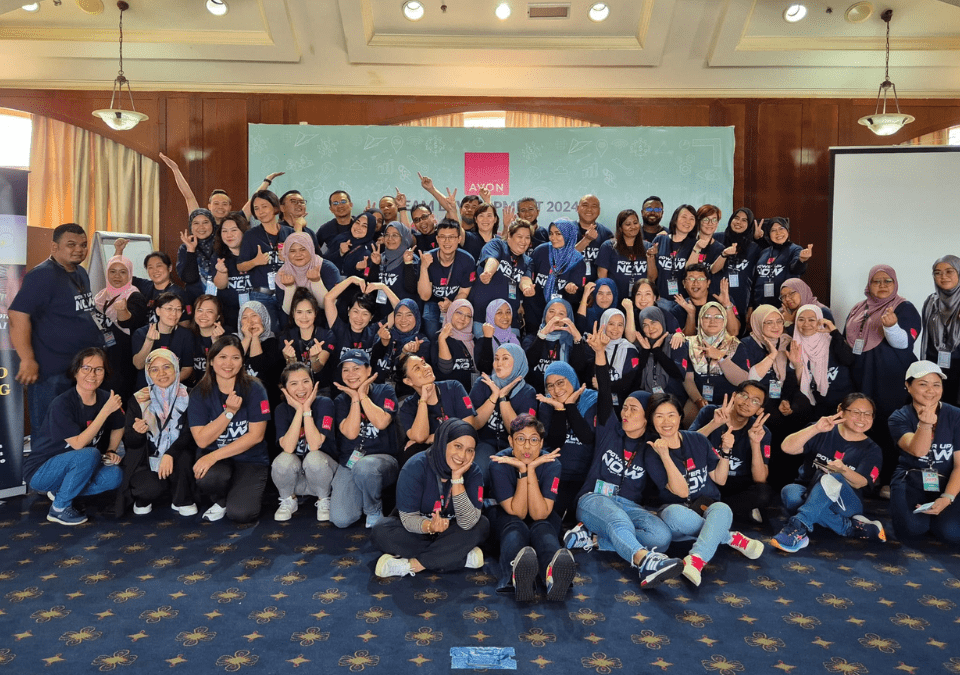 Stronger Together HRDF team building activity with participants engaging in group trust exercises