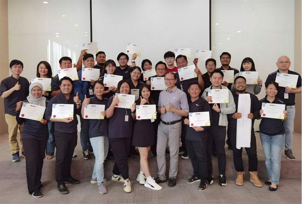 Receiving certification after completing Talent Pro’s Business with AI training